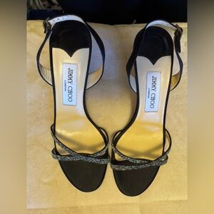 Jimmy Choo Black and Glittering Gold Heels